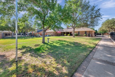 LOVELY UPDATED PROPERTY SITUATED ON THE GOLF COURSE (8 EAST on Green Tree Country Club in Texas - for sale on GolfHomes.com, golf home, golf lot