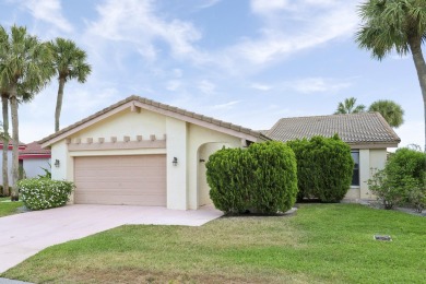Welcome home to 5695 Lakeview Mews Drive in the heart of Boynton on Indian Spring Golf and Country Club in Florida - for sale on GolfHomes.com, golf home, golf lot