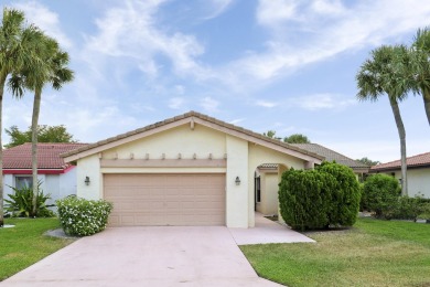 Welcome home to 5695 Lakeview Mews Drive in the heart of Boynton on Indian Spring Golf and Country Club in Florida - for sale on GolfHomes.com, golf home, golf lot