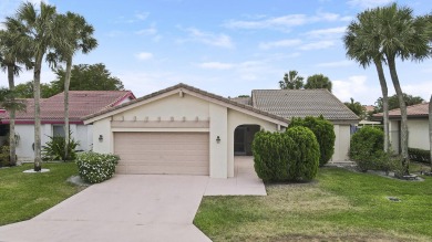 Welcome home to 5695 Lakeview Mews Drive in the heart of Boynton on Indian Spring Golf and Country Club in Florida - for sale on GolfHomes.com, golf home, golf lot