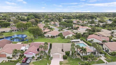 Welcome home to 5695 Lakeview Mews Drive in the heart of Boynton on Indian Spring Golf and Country Club in Florida - for sale on GolfHomes.com, golf home, golf lot