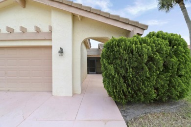 Welcome home to 5695 Lakeview Mews Drive in the heart of Boynton on Indian Spring Golf and Country Club in Florida - for sale on GolfHomes.com, golf home, golf lot