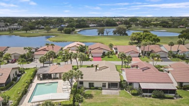 Welcome home to 5695 Lakeview Mews Drive in the heart of Boynton on Indian Spring Golf and Country Club in Florida - for sale on GolfHomes.com, golf home, golf lot