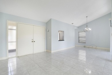 Welcome home to 5695 Lakeview Mews Drive in the heart of Boynton on Indian Spring Golf and Country Club in Florida - for sale on GolfHomes.com, golf home, golf lot