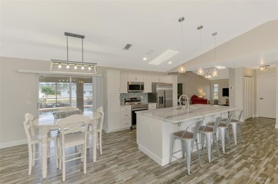 ***WATERFRONT POOL HOME IN THE PEBBLE BEACH GOLFING COMMUNITY*** on Rotonda Golf and Country Club The Palms Course in Florida - for sale on GolfHomes.com, golf home, golf lot