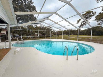 Newly updated Golf Course Home with pool and lanai For Sale! on The Golf Club of the Wharf in Alabama - for sale on GolfHomes.com, golf home, golf lot