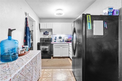 Welcome to this well-located 3-bedroom, 2-bath home in the heart on West Palm Beach Golf Course in Florida - for sale on GolfHomes.com, golf home, golf lot