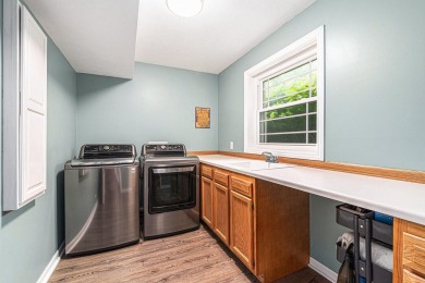 This executive ranch-style home has been stylishly updated and on Railside Golf Club in Michigan - for sale on GolfHomes.com, golf home, golf lot