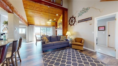 LAKE OF THE OZARKS | TOP-FLOOR CONDOMINIUM Enjoy breathtaking on The Oaks Golf Course in Missouri - for sale on GolfHomes.com, golf home, golf lot