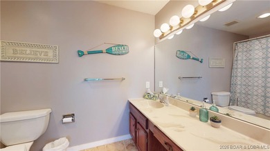 LAKE OF THE OZARKS | TOP-FLOOR CONDOMINIUM Enjoy breathtaking on The Oaks Golf Course in Missouri - for sale on GolfHomes.com, golf home, golf lot