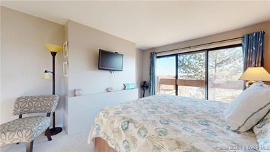 LAKE OF THE OZARKS | TOP-FLOOR CONDOMINIUM Enjoy breathtaking on The Oaks Golf Course in Missouri - for sale on GolfHomes.com, golf home, golf lot