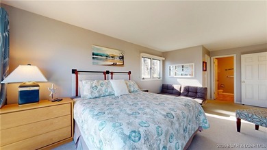 LAKE OF THE OZARKS | TOP-FLOOR CONDOMINIUM Enjoy breathtaking on The Oaks Golf Course in Missouri - for sale on GolfHomes.com, golf home, golf lot