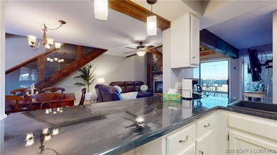 LAKE OF THE OZARKS | TOP-FLOOR CONDOMINIUM Enjoy breathtaking on The Oaks Golf Course in Missouri - for sale on GolfHomes.com, golf home, golf lot