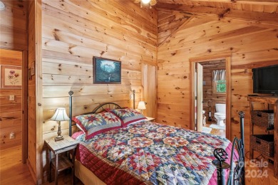 Welcome to your dream cabin nestled in the highly sought-after on Rumbling Bald Resort on Lake Lure in North Carolina - for sale on GolfHomes.com, golf home, golf lot