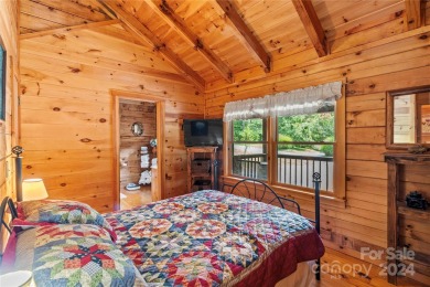 Welcome to your dream cabin nestled in the highly sought-after on Rumbling Bald Resort on Lake Lure in North Carolina - for sale on GolfHomes.com, golf home, golf lot