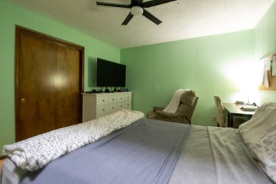 Surprise! That's the best way to describe this home because of on Fremont Hills Country Club in Missouri - for sale on GolfHomes.com, golf home, golf lot