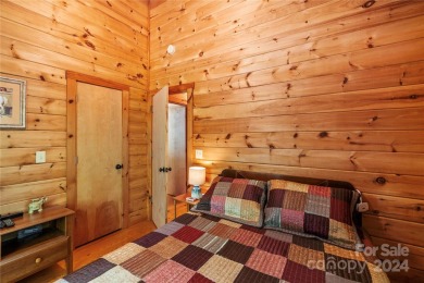 Welcome to your dream cabin nestled in the highly sought-after on Rumbling Bald Resort on Lake Lure in North Carolina - for sale on GolfHomes.com, golf home, golf lot