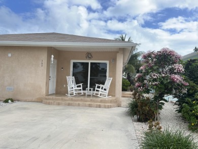 This home is truly impressive with its 3 bedrooms, 2 baths on Key Colony Beach Golf Course in Florida - for sale on GolfHomes.com, golf home, golf lot
