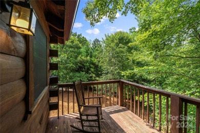 Welcome to your dream cabin nestled in the highly sought-after on Rumbling Bald Resort on Lake Lure in North Carolina - for sale on GolfHomes.com, golf home, golf lot