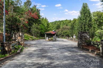 Welcome to your dream cabin nestled in the highly sought-after on Rumbling Bald Resort on Lake Lure in North Carolina - for sale on GolfHomes.com, golf home, golf lot