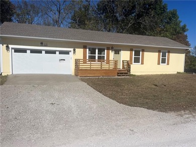 This home is in the community of Linn Valley Lakes. A wonderful on Linn Valley Lakes - Deer Trace Golf Course in Kansas - for sale on GolfHomes.com, golf home, golf lot