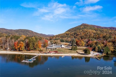 Welcome to your dream cabin nestled in the highly sought-after on Rumbling Bald Resort on Lake Lure in North Carolina - for sale on GolfHomes.com, golf home, golf lot