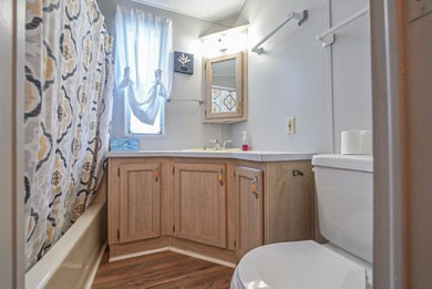 Motivated Seller! Discover a cozy 1-bedroom, 1-bathroom park on Ironwood Golf Course in Arizona - for sale on GolfHomes.com, golf home, golf lot