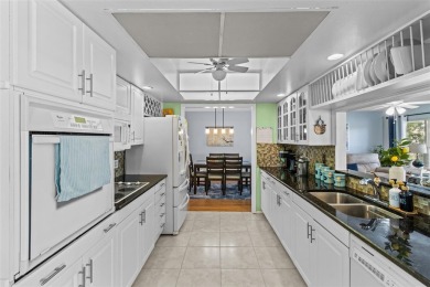 Welcome to your dream home! This beautifully updated 2-bedroom on Mainlands Golf Club in Florida - for sale on GolfHomes.com, golf home, golf lot