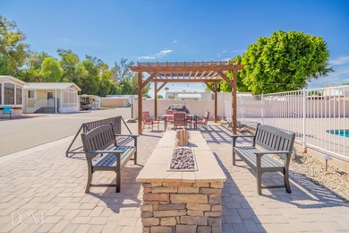 Motivated Seller! Discover a cozy 1-bedroom, 1-bathroom park on Ironwood Golf Course in Arizona - for sale on GolfHomes.com, golf home, golf lot