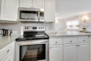 Welcome to 704 Saxony O, a beautifully renovated 2nd-floor condo on Kings Point Golf -Flanders Way in Florida - for sale on GolfHomes.com, golf home, golf lot