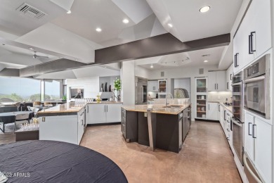 This contemporary home offers exceptionally elevated & stunning on Desert Mountain Golf Club - Renegade Course in Arizona - for sale on GolfHomes.com, golf home, golf lot