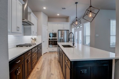Tucked inside a secure, gated community, this modern on Stevens Park Golf Course in Texas - for sale on GolfHomes.com, golf home, golf lot