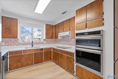 Stylish mid-century modern on a prime corner lot in vibrant on Point Mallard Golf Course in Alabama - for sale on GolfHomes.com, golf home, golf lot