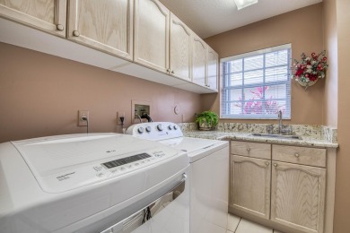 Experience effortless Florida living in this meticulously on PGA National Golf Club in Florida - for sale on GolfHomes.com, golf home, golf lot