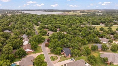 Stunning  updated home in the Prestigious Pecan Plantation Golf on Pecan Plantation Country Club in Texas - for sale on GolfHomes.com, golf home, golf lot
