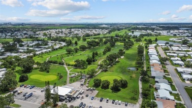 Welcome to your dream home! This beautifully updated 2-bedroom on Mainlands Golf Club in Florida - for sale on GolfHomes.com, golf home, golf lot