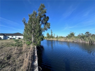 SEAWALL IN PLACE!!! Great waterfront building lot located in on Burnt Store Golf Club in Florida - for sale on GolfHomes.com, golf home, golf lot