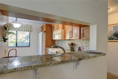 MOTIVATED SELLER....E HOME TO PELICAN POINTE.... One of on Pelican Pointe 9 Hole Course in Florida - for sale on GolfHomes.com, golf home, golf lot