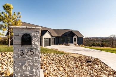 Are you looking for a new home, but don't want to wait 18 months on Ledgestone Country Club and Golf Course in Missouri - for sale on GolfHomes.com, golf home, golf lot