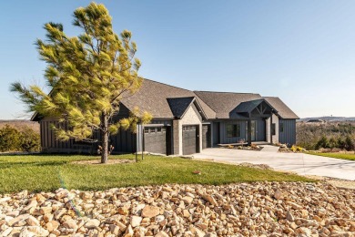 Are you looking for a new home, but don't want to wait 18 months on Ledgestone Country Club and Golf Course in Missouri - for sale on GolfHomes.com, golf home, golf lot