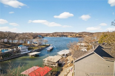 Set along the gorgeous shoreline of Lake of the Ozarks, this on Bayview Golf Course in Missouri - for sale on GolfHomes.com, golf home, golf lot