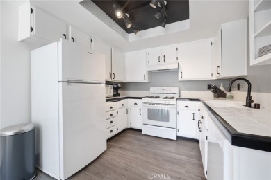Enjoy your private patio and beautiful sunsets from this move-in on Azusa Greens Country Club in California - for sale on GolfHomes.com, golf home, golf lot