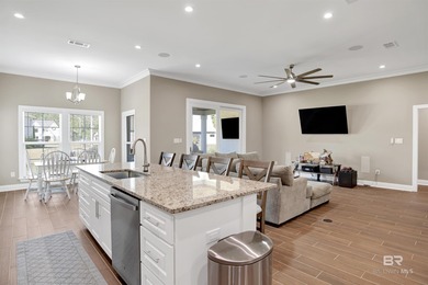 Discover exceptional coastal living in this stunning 3-bedroom on Peninsula Golf and Racquet Club in Alabama - for sale on GolfHomes.com, golf home, golf lot