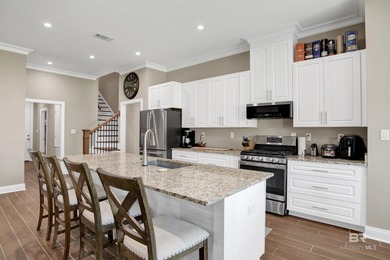 Discover exceptional coastal living in this stunning 3-bedroom on Peninsula Golf and Racquet Club in Alabama - for sale on GolfHomes.com, golf home, golf lot