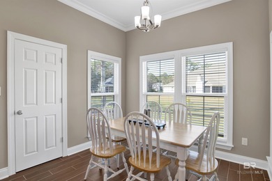 Discover exceptional coastal living in this stunning 3-bedroom on Peninsula Golf and Racquet Club in Alabama - for sale on GolfHomes.com, golf home, golf lot