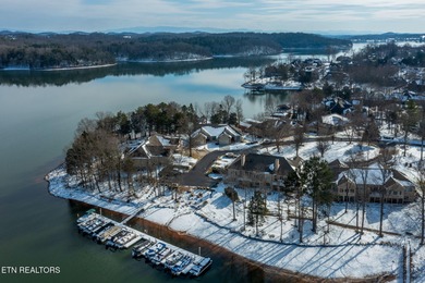 Wake up to shimmering lake views and end your day surrounded by on Tanasi Golf Course in Tennessee - for sale on GolfHomes.com, golf home, golf lot