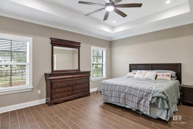 Discover exceptional coastal living in this stunning 3-bedroom on Peninsula Golf and Racquet Club in Alabama - for sale on GolfHomes.com, golf home, golf lot