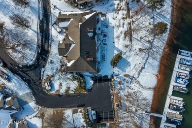 Wake up to shimmering lake views and end your day surrounded by on Tanasi Golf Course in Tennessee - for sale on GolfHomes.com, golf home, golf lot