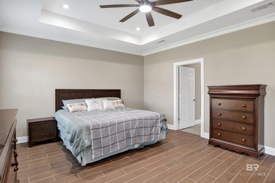 Discover exceptional coastal living in this stunning 3-bedroom on Peninsula Golf and Racquet Club in Alabama - for sale on GolfHomes.com, golf home, golf lot