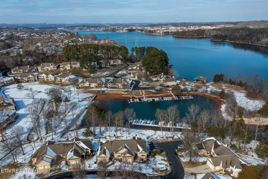 Wake up to shimmering lake views and end your day surrounded by on Tanasi Golf Course in Tennessee - for sale on GolfHomes.com, golf home, golf lot